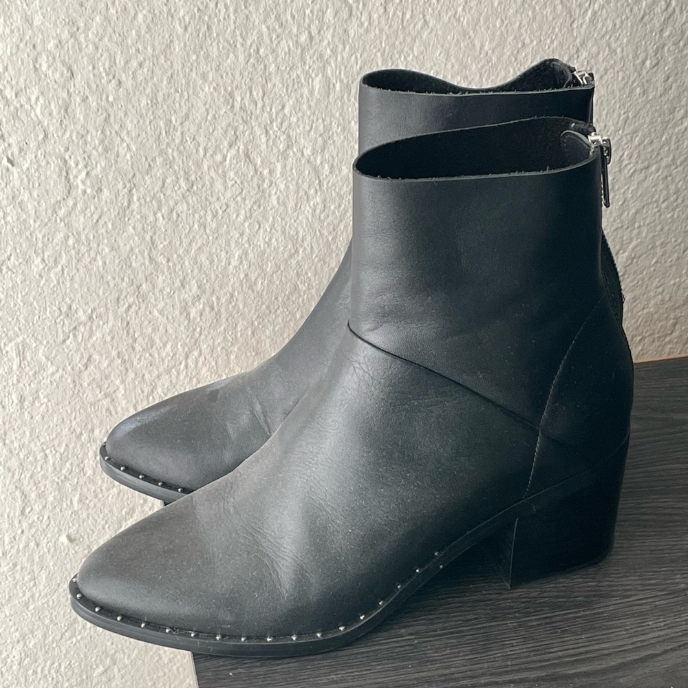 Black pointed toe studded booties